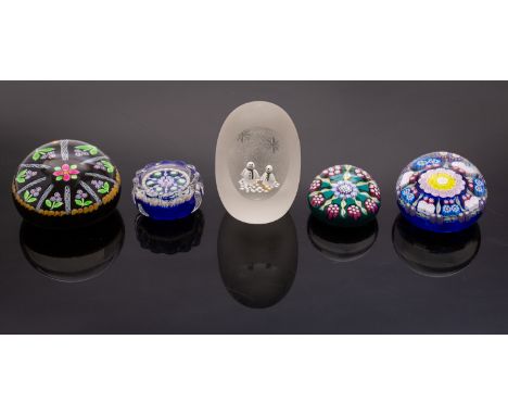 Three Perthshire paperweights, comprising a Medium Millefiori Weight set with galleried concentric rings around pink and yell