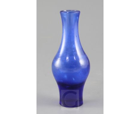 A Chinese Beijing blue glass baluster vase, engraved four character Jiaqing mark to the base and possibly of the period, 18.2