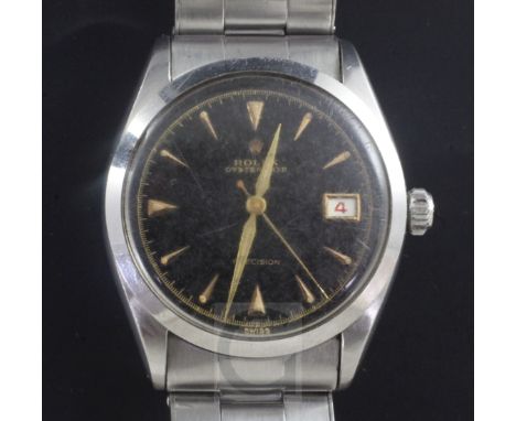 A gentleman's 1950's stainless steel Rolex Oysterdate Precision manual wind wrist watch, with black dial, arrowhead numerals 