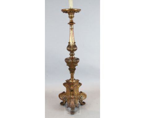 A North Italian giltwood floor standing altar candlestick, H.4ft 10.5in.