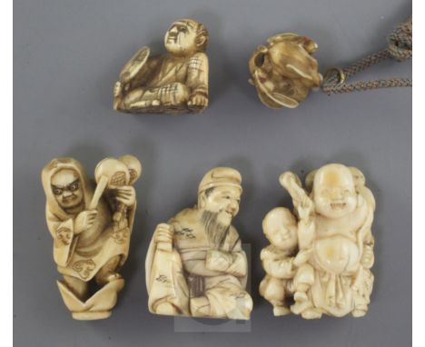 Four Japanese ivory netsuke and a similar ojime, Meiji period, two of the netsuke carved as immortals, the other two of seate