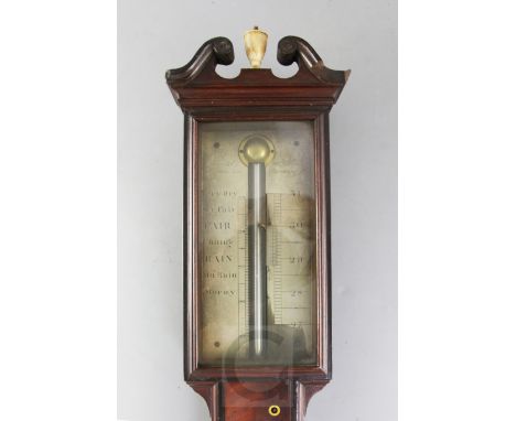 Harris & Co, 30 Holborn, London and Hamburg. An early 19th century mahogany stick barometer, with silvered scale and thermome