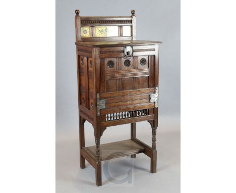 Attributed to Charles Lock Eastlake. A Victorian Aesthetic movement walnut writing desk, with tile inset back and fall front 