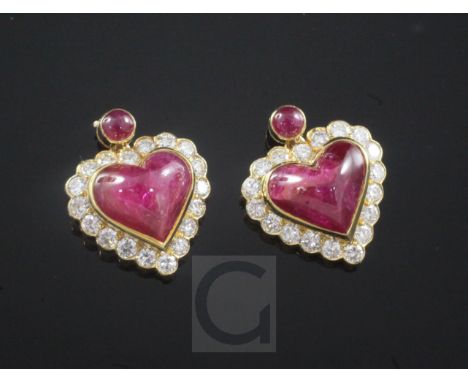 A pair of gold, ruby and diamond set heart shaped earrings, unmarked, 20mm.