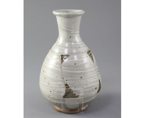 Bernard Leach (1887-1979). A bottle shaped vase, the celadon-grey vase with white slip trailing rust brown triangle and sgraf