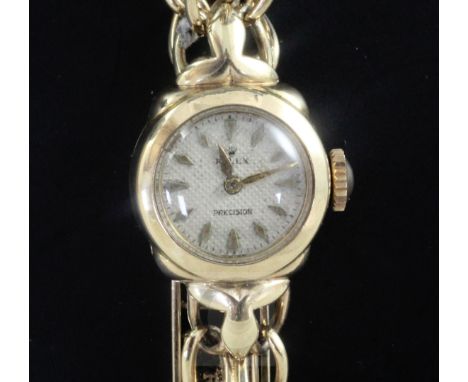 A lady's 1950's 9ct gold Rolex manual wind wrist watch, with baton numerals, on a 9ct gold Rolex double fancy link bracelet.