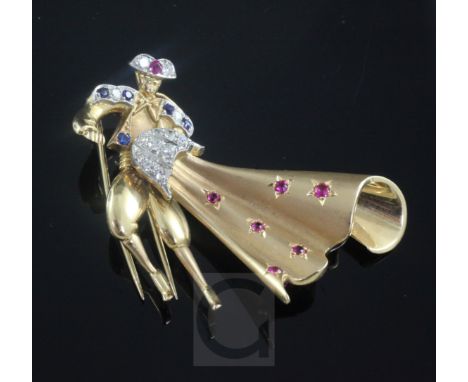 A gold, ruby, sapphire and diamond set novelty clip brooch, modelled as a Matador, gross 16.3 grams, 56mm.