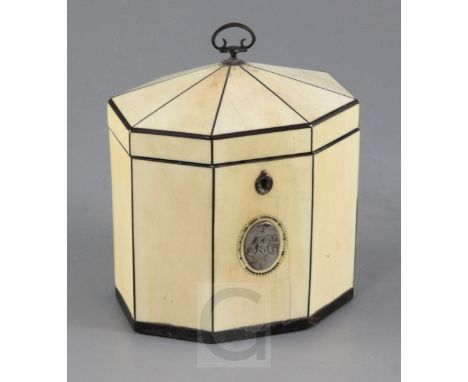 A Regency ebony strung ivory tea caddy, of octagonal form with monogrammed silver plaque and internal lid, H.5.5in.