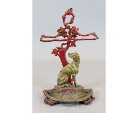 A Victorian painted cast iron 'Cavé Canem' stick stand, W.1ft 6in. H.2ft 5in.