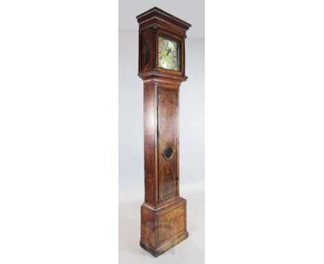 Thomas Ingram of London. An early 18th century walnut and seaweed marquetry eight day longcase clock, the 12 inch square bras