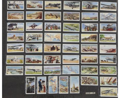 Four folio albums of cigarette cards on topographical themes, Buildings, Monuments, etc., mainly full sets, including: Anstie