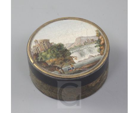 A 19th century Italian micro-mosaic and tortoiseshell snuff box, the lid decorated with the view of the falls at Tivoli, diam