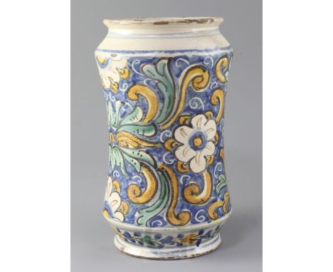 A Montelupo maiolica albarello, 18th century, polychrome painted with flowers and foliage on a blue ground, 27.5cm