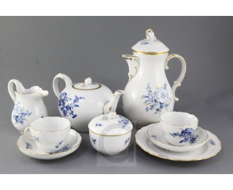 A Meissen blue and gilt decorated floral tea and coffee set for twelve place settings, 20th century, including coffee pot, te