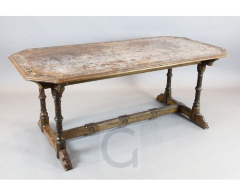 Attributed to A.W.N.Pugin. A Victorian gothic revival marquetry inlaid walnut library table, the octagonal top with flower mo