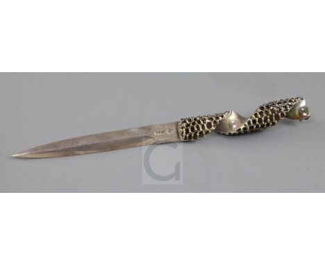 A 1970's silver letter opener by Stuart Devlin, with spiral twist openwork handle, London, 1978, 24.2cm, 129 grams.