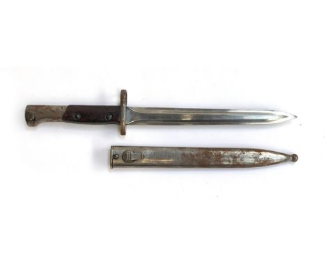 A Belgian SA30 bayonet with 9inch double edge blade and two piece wooden grip complete with steel scabbard stamped 8042 SA30 