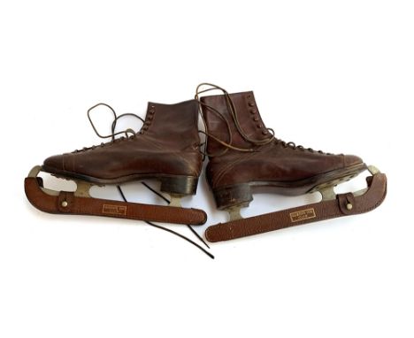 A pair of vintage ice skates, Lilley &amp; Skinner 'The Ice Boot' with Queens Ice Club blade guard 