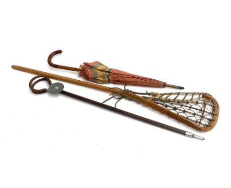 A vintage lacrosse stick, shooting stick, and umbrella (3) 