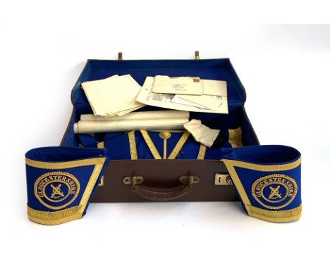 Masonic interest: a brown leather suitcase lined in blue, containing a turquoise sash; a Gloucestershire apron; ceremonial cu
