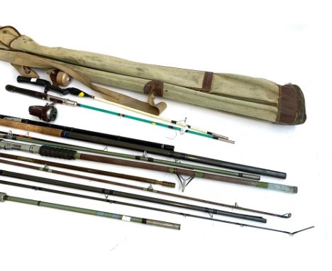 A mixed lot of sea and coarse fishing rods, together with various vintage reels, and a gun cleaner, a vintage rod bag; togeth