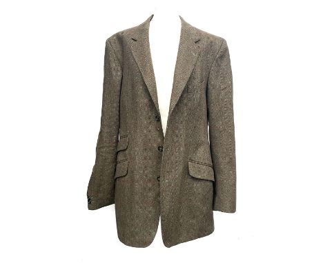 A gent's single breasted tweed jacket, three buttons, single vent to rear, Magee tailored, retailed by R Scott &amp; Co., Cir
