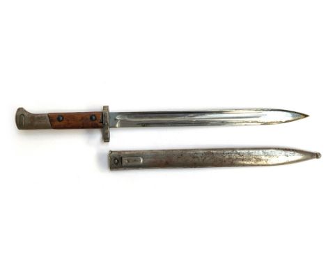 A German bayonet, the hilt marked E3 48, the scabbard E3 46, blade length 30cm 