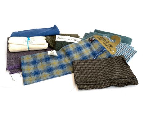 A quantity of vintage tweed skirt lengths including that woven at Dartington Hall, Totnes, Devon 