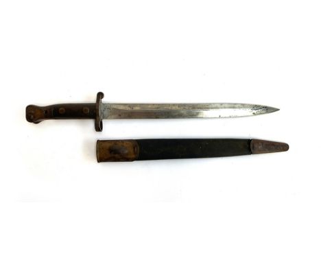 A British P1888 bayonet, 12 inch double edged blade, forte with crowned VR and marked for EFD (Enfield), in a steel mounted l