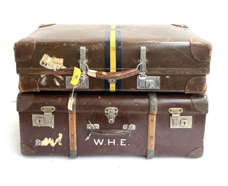 A vintage revelation suitcase with leather corners, the top marked W.H.E, with key; together with one other similar with wood