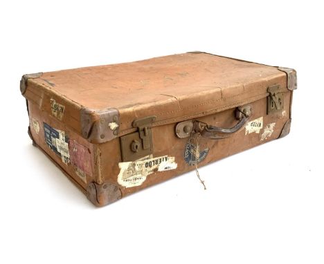 A vintage suitcase, with leather corner fittings, various travel stickers including Weymouth, Cunard White Star etc, 72x49x29