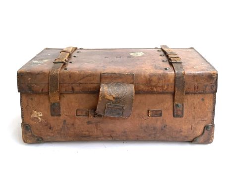 A Victorian leather and brass studded trunk by W. Insall &amp; Sons, Bristol, with leather straps and carrying handles and st