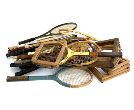 A quantity of vintage tennis and squash rackets, including Dunlop, together with some vintage presses 