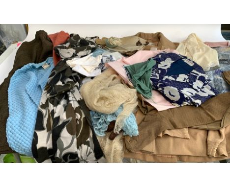 A large quantity of vintage clothes, to include a Maude Jackson camel hair coat; a leather waistcoat; gardening gloves; heads