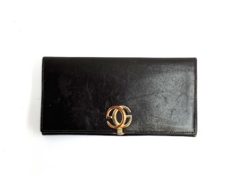 A vintage Gucci dark brown leather ladies wallet, with green leather lining 