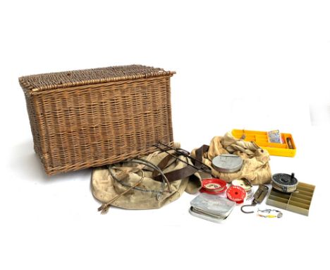 A vintage wicker fishing creel, 50x30x35, together with two canvas fishing bags, alloy cast boxes, salter scales, lures, shot