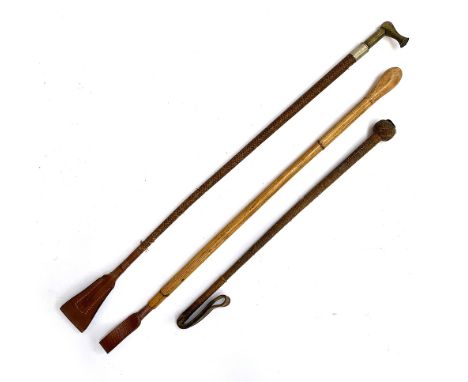 Three vintage riding whips, one bamboo, another with a brass tamping attachment (3) 