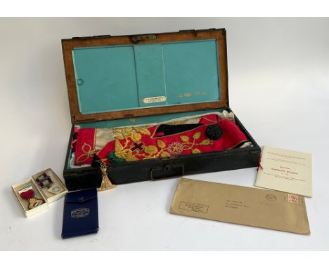 Masonic interest: a black painted box from D.R. Taylor, Nailsworth Gloucestershire, containing ceremonial sash and various me