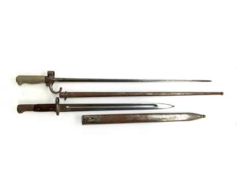 A WW1 French Lebel bayonet with 520mm cruciform blade, hooked quillion, white metal hilt, with scabbard; together with one ot