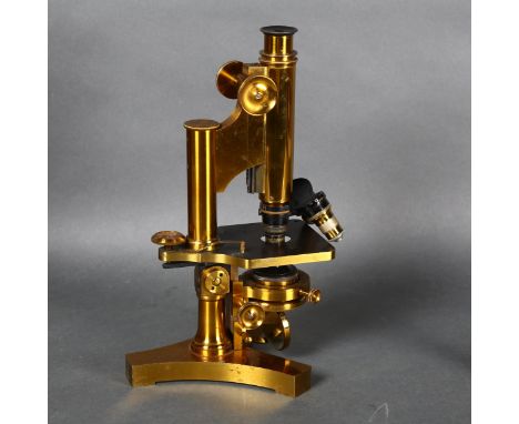 R & J Beck Ltd, London - A Victorian brass microscope, serial number 20568, complete with eight various extra lenses, cased 