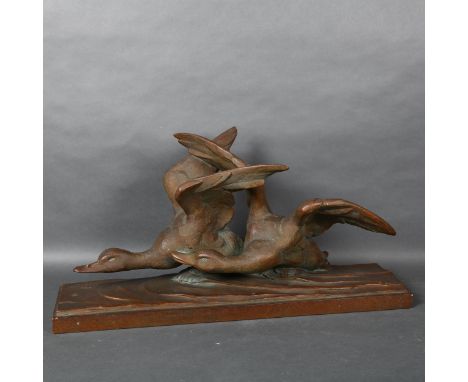 A large patinated bronzed terracotta study of flying geese, signed R Pollin, L72cm 