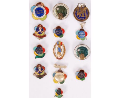 A collection of 13x original vintage Soviet Union & communist enamel World Festival of Youth & Students sports event pin badg