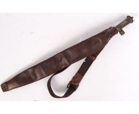 A late 19th / early 20th century leather and brass powder / shot flask. The brass nozzle in working order. With leather carry