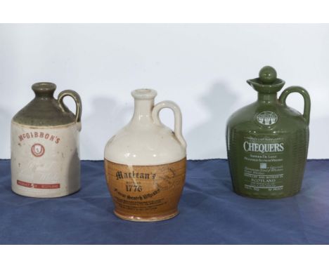 Three vintage whisky flasks