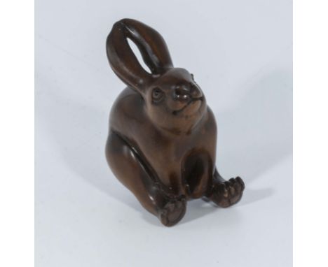 Hand carved hardwood netsuke of a rabbit 