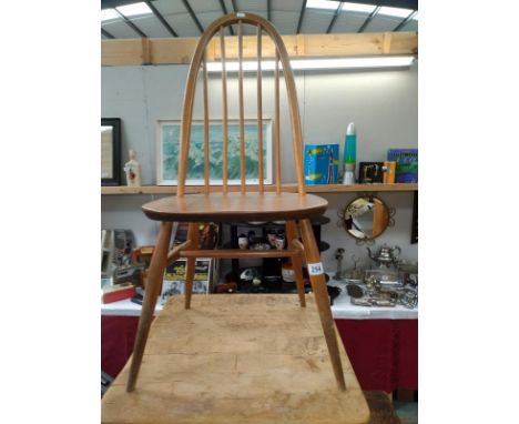 A light Beech colour 'Quaker' dining chair.