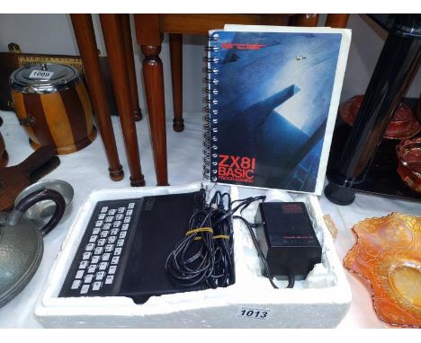 A ZX-81 &amp; manual (in original packaging but no sleeve)