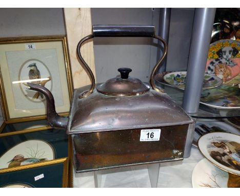 An unusual square copper kettle 