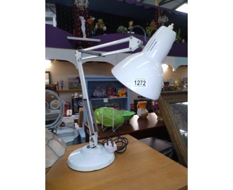 AN angle poise lamp.
