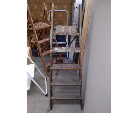 A vintage wooden step ladder